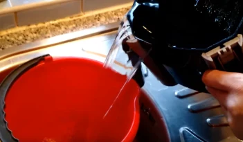 Put the water inside a bucket